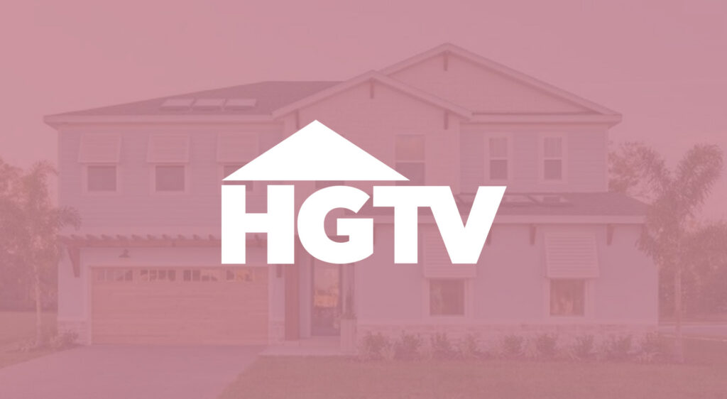 A pink-toned promotional image featuring a modern two-story home with the white HGTV logo centered prominently in the foreground. The home includes a two-car garage, large windows, and palm trees visible in the background.
